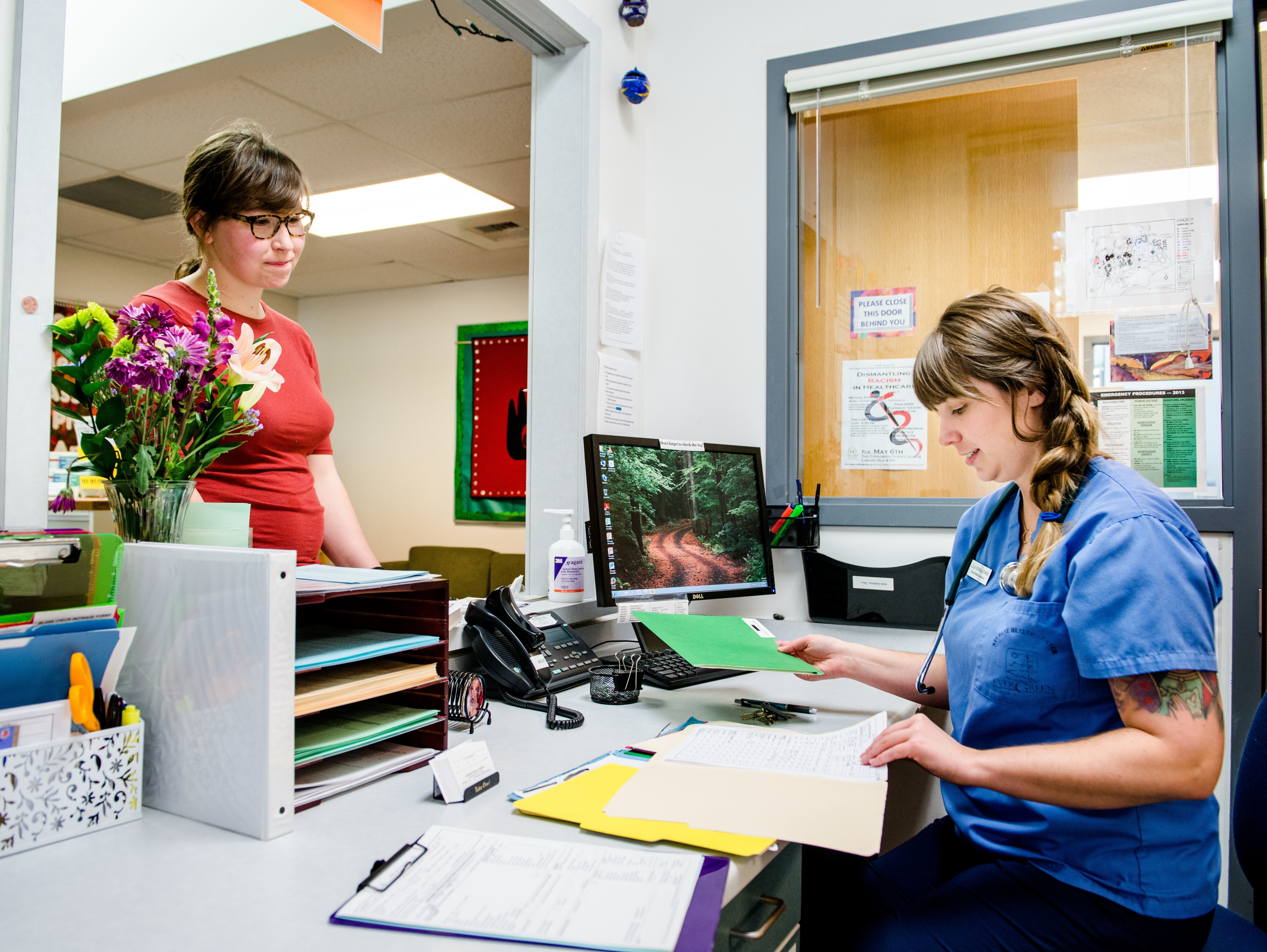 Administrator checks in a patient