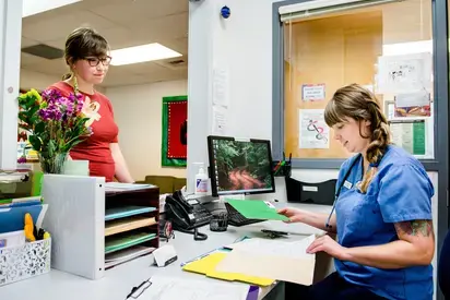 Administrator checks in a patient