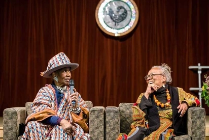 Maxine Mimms seated next to Joye Hardiman in 2019