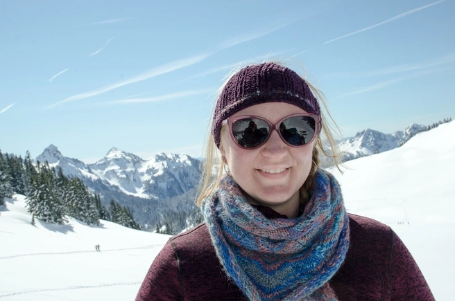 Cathy Flora smiling on a snowy mountainside