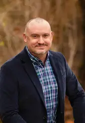 Headshot of Andrew Beattie, Executive Associate to the President