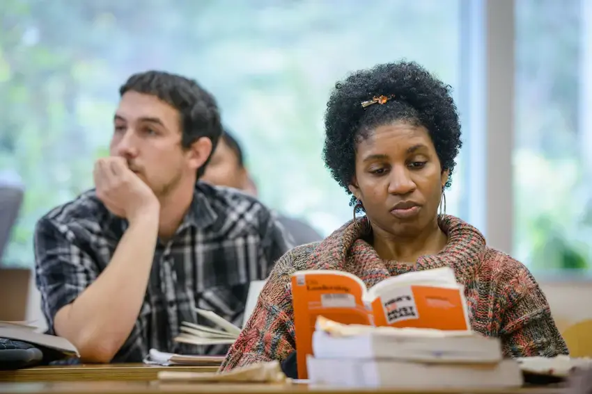 Students in classroom during a lecture and discussion session.