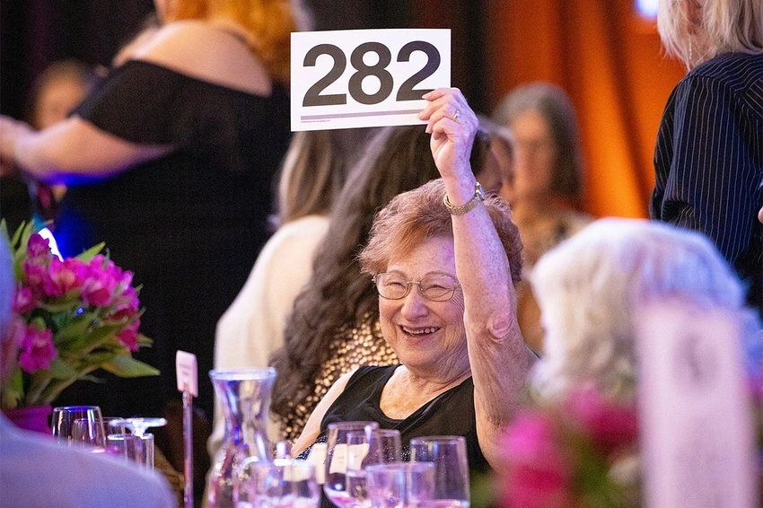 Bidder at the Art of Giving Auction