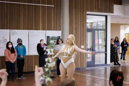 Community gathering in Evans Hall + Drag Story Telling and Performance